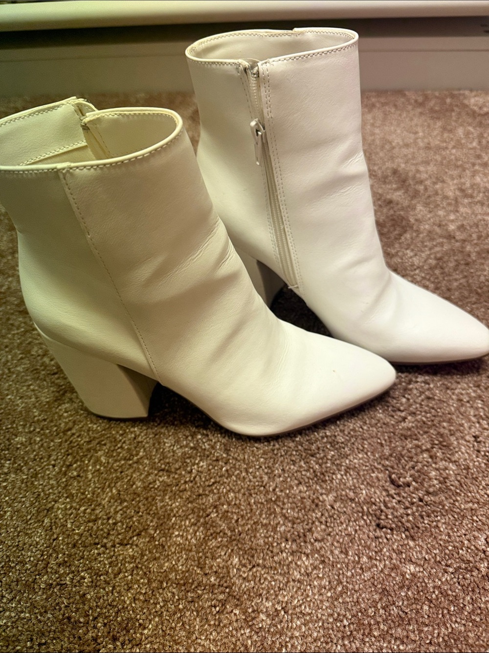 Women’s white heeled boots